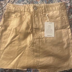 Small rose gold skirt.